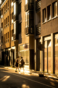 Berlin Mitte people walking on golden hour