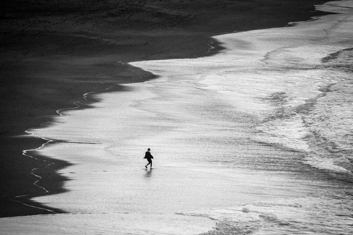 Girl-on-waves-black-and-white